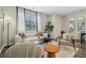 Inviting living room with a plush sofa, modern lighting, and a view of the outdoors at 2363 Haran Dr # 35, Lithonia, GA 30058
