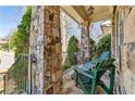 Inviting front porch area complete with stone columns and cozy seating space at 4541 Gateway Se Ct, Smyrna, GA 30080