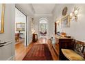 Grand foyer with hardwood floors, decorative trim, and elegant furnishings at 2 W Muscogee Nw Ave, Atlanta, GA 30305