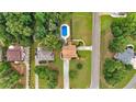 Aerial view of a home featuring a private pool, spacious yard, and surrounded by lush greenery at 17 River Walk Pkwy, Euharlee, GA 30145