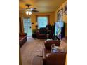 Cozy living room featuring plush leather furniture and natural light at 2800 Browntown Nw Rd, Atlanta, GA 30318