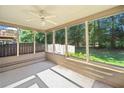 Covered porch with wooded backyard view at 100 Trailside Way, Hiram, GA 30141