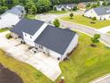 Aerial view of the backyard and garage showing the property layout and surrounding neighborhood at 6330 Garden Cir, Douglasville, GA 30135