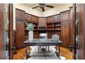 Home office with custom cabinetry, hardwood floors, and ample natural light at 3180 Mathieson Ne Dr # 1401, Atlanta, GA 30305