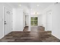 Bright living room with modern floors, fresh white paint, and large sliding glass doors at 3232 Abbeywood Dr, Decatur, GA 30034