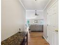 Welcoming foyer with hardwood floors leading to a spacious living area at 528 Savannah Rose Way, Lawrenceville, GA 30045