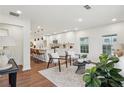 Bright living space features an open layout and hardwood floors, creating an inviting atmosphere at 598 Taylor Se Dr, Smyrna, GA 30080