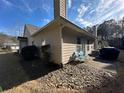 The backyard features river rock, patio seating and an external chimney at 1360 Raven Rock Nw Trl, Kennesaw, GA 30152