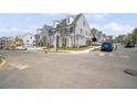 Street view featuring a gray home with white trim and a well-maintained lawn at 591 Brashy St, Woodstock, GA 30188