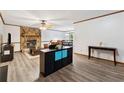 Cozy living room with wood-burning fireplace and durable flooring at 251 Sabrina Ct, Woodstock, GA 30188