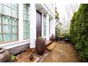 Charming front porch with decorative planters and seating area, offering a welcoming entrance to the home at 2067 Telfair Circle # A&B, Atlanta, GA 30324