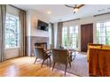 Bright living room with fireplace, large windows, hardwood floors, and comfortable seating, perfect for relaxation at 2067 Telfair Circle # A&B, Atlanta, GA 30324