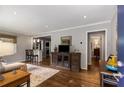 Open living area with hardwood floors and sightlines into the kitchen at 1060 Pinedale Se Dr, Smyrna, GA 30080
