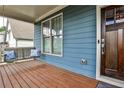 Relax on the inviting front porch swing of this lovely blue home at 2956 Silver Hill Se Ter, Atlanta, GA 30316