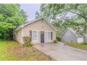 Well-maintained one-story home with neutral siding, traditional windows, and a convenient driveway at 5888 Old Wellborn Trce, Lithonia, GA 30058
