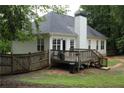 View of wooden deck and fenced yard, a relaxing outdoor space at 262 Devynwood Ln, Dallas, GA 30157