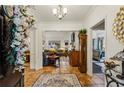 Spacious foyer featuring tile flooring, views to formal living and dining areas, and neutral decor at 107 W Point Trl, Woodstock, GA 30189