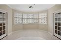 Well-lit living room featuring large windows offering lots of natural light and neutral paint at 2499 Peachtree Rd # 506, Atlanta, GA 30305