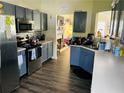 Well-equipped kitchen features modern appliances, sleek countertops, and ample cabinet space at 5814 Highgrove Dr, Atlanta, GA 30349