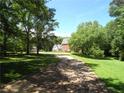 Long driveway leading to a grand brick home at 1811 Murdock Rd, Marietta, GA 30062