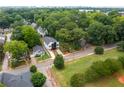 Bird's-eye view of a modern home nestled among lush trees and greenery in a residential neighborhood at 178 Wesley Ne Ave # B, Atlanta, GA 30307