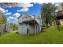 This house features an elevated back deck offering a nice view of the surrounding yard and neighborhood at 1139 Mainstreet Valley Dr, Stone Mountain, GA 30088