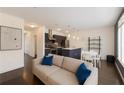 Modern living space with open layout, stainless steel appliances and hardwood floors throughout at 1300 Dekalb Ne Ave # 221, Atlanta, GA 30307