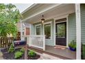 Charming front porch with stylish decor, offering a cozy outdoor space at 151 Savannah Se St, Atlanta, GA 30316