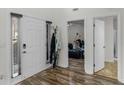Inviting entryway features wood-look floors, a coat rack, and neutral paint at 3430 Grand Manor Trl, Snellville, GA 30039