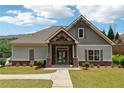 Charming community clubhouse with stone and siding exterior details and manicured lawn at 2182 Talmai Dr, Snellville, GA 30078