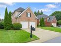 Attractive brick home with a two-car garage and mature landscaping at 3032 Montclair Se Cir, Smyrna, GA 30080