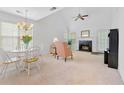 Spacious living room with vaulted ceilings, fireplace, and natural light at 3040 Majestic Park Ct, Duluth, GA 30096