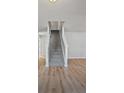 A view of the home's carpeted stairway at 6684 Crane Ave, Fairburn, GA 30213