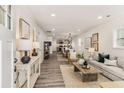 Inviting living room boasts stylish decor, hardwood floors, and plenty of natural light at 1062 Grant Terrace, Atlanta, GA 30315