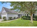 Well-maintained home with attractive landscaping and a welcoming front entrance at 104 Terrapin Ct, Carrollton, GA 30116