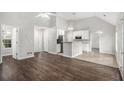 Bright living space seamlessly connects to the kitchen, creating an ideal flow for modern living at 104 Terrapin Ct, Carrollton, GA 30116