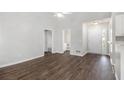 Open-concept living area with updated flooring and natural light, perfect for entertaining at 104 Terrapin Ct, Carrollton, GA 30116