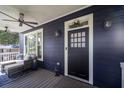 Inviting front porch featuring a seating area and stylish decor at 1164 Baylor Nw St, Atlanta, GA 30318