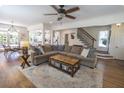 Open-concept living space with dining area and staircase at 1164 Baylor Nw St, Atlanta, GA 30318