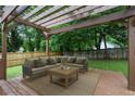 Cozy outdoor patio with pergola and comfortable seating area, great for entertaining at 1245 Ladd Sw St, Atlanta, GA 30310