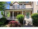 Inviting front porch with classic railings and steps leading to the entrance at 2889 Carrousel Ct, Stone Mountain, GA 30087