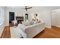 Bright living room with hardwood floors, fireplace, and stylish decor at 1383 Fenway Cir, Decatur, GA 30030
