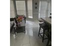 Breakfast nook with tile floors, bright windows, and casual seating area at 2735 Parkway Trl, Lithonia, GA 30058