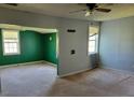 Comfortable living room with large windows and an open layout at 7217 Union Grove Rd, Lithonia, GA 30058