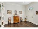 Bright foyer with hardwood floors, custom built-ins, and elegant furnishings at 3585 Roxboro Ne Rd # 2, Atlanta, GA 30326