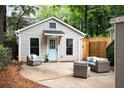 The outdoor seating on the patio makes the backyard a great space for relaxing and entertaining at 1583 Braeburn Se Dr, Atlanta, GA 30316