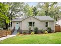 Well-manicured front yard and covered entryway create a welcoming entrance to this inviting home at 1583 Braeburn Se Dr, Atlanta, GA 30316