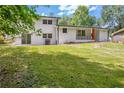 Expansive backyard with lush green grass, offering plenty of space for outdoor activities at 2678 Rainbow Forest Dr, Decatur, GA 30034