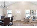 Bright, open-concept living area with high ceilings and modern lighting at 2294 Hill Nw St, Atlanta, GA 30318