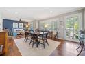 Spacious dining area with hardwood floors and lots of natural light from the backyard at 755 Monticello Se Way, Marietta, GA 30067